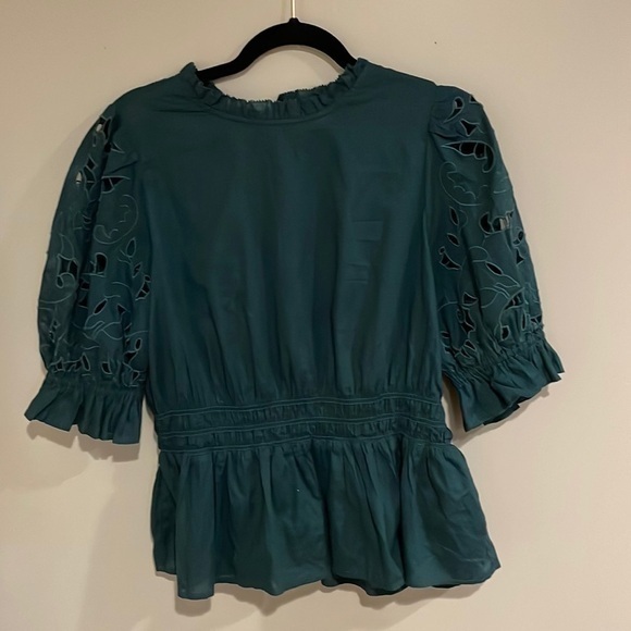 Size large green top. - Picture 1 of 3